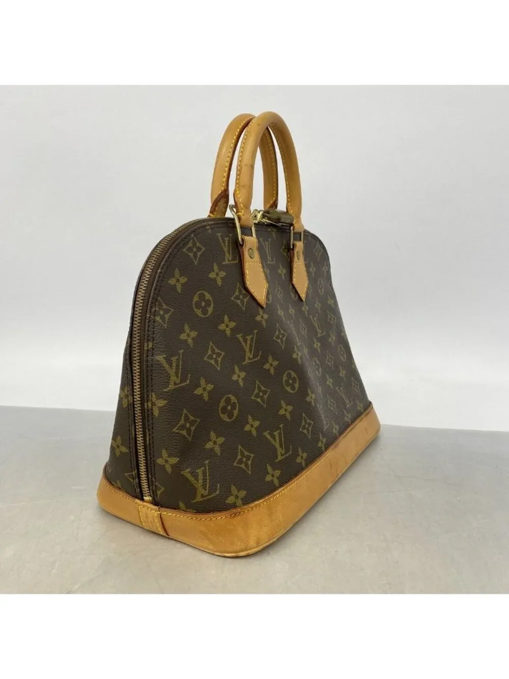 Louis Vuitton Monogram Alma Brown Handbag